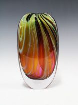 DAVID FLOWER, AUTUMN art glass vase of flattened form with green, red and orange swirled pattern,