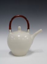 Suleyman Saba, (Australian b.1969) pale celadon glaze teapot with red lacquered handle, overall