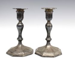 A pair of Victorian silver candlesticks, Sheffield 1892, knop stemmed with detachable sconce and