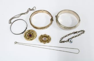 Three silver bangles, two Victorian yellow metal brooches, white metal chains and bracelet, etc (a