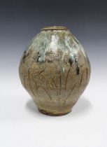 MIKE DODD (BRITISH, b.1943) studio pottery vase with two ash glaze and textured pattern, incised