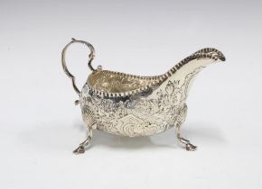 Edwardian Irish silver cream jug, with birds and flower decoration, West & Son, Dublin 1903, 15cm