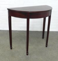 Modern demi lune foldover table of neat proportions, on tapering legs with spade feet, 84 x 77 x