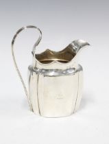 18th century Irish silver cream jug of helmet form, indistinct maker's mark, Dublin 1796, 13cm