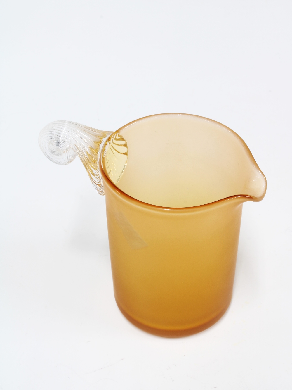 Bob Crooks amber glass Nautilus jug with clear handle, 10cm high - Image 2 of 2