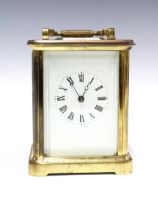 Brass and glass cased carriage clock of large proportions, 18cm high including handle