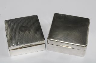 Two silver cigarette boxes, one with 1922 inscription and the other with Birmingham 1934