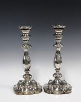 A pair of silver plated knop stem candlesticks, circular weighted bases (2) 29cm high.