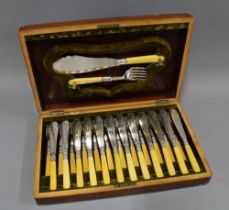Epns set of twelve fish knives and forks with matching servers, composite handles, contained