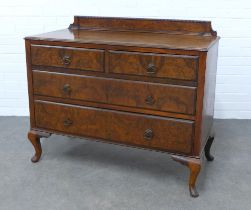 Early 20th century walnut ledge back chest, with two short and two long drawers, standing on short