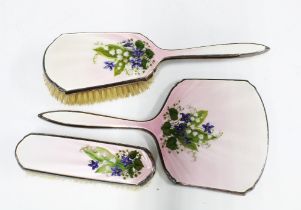 George VI silver and enamel dressing table brush set, with lily of the valley pattern, London