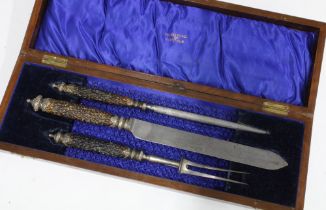 Walker & Hall three piece carving set, horn handles with white metal mounts, in fitted mahogany case