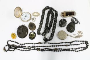 A collection of Victorian and later Jet jewellery together with a silver locket and a silver