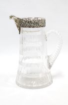 Victorian cut glass lemonade pitcher or water jug, with silver mounts by William Comyns & Sons,