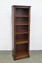 An Ercol elm open bookcase, 65 x 197 x 34cm.