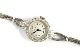 9ct white gold diamond set Vertex cocktail watch, on a white gold bracelet strap, stamped 375,