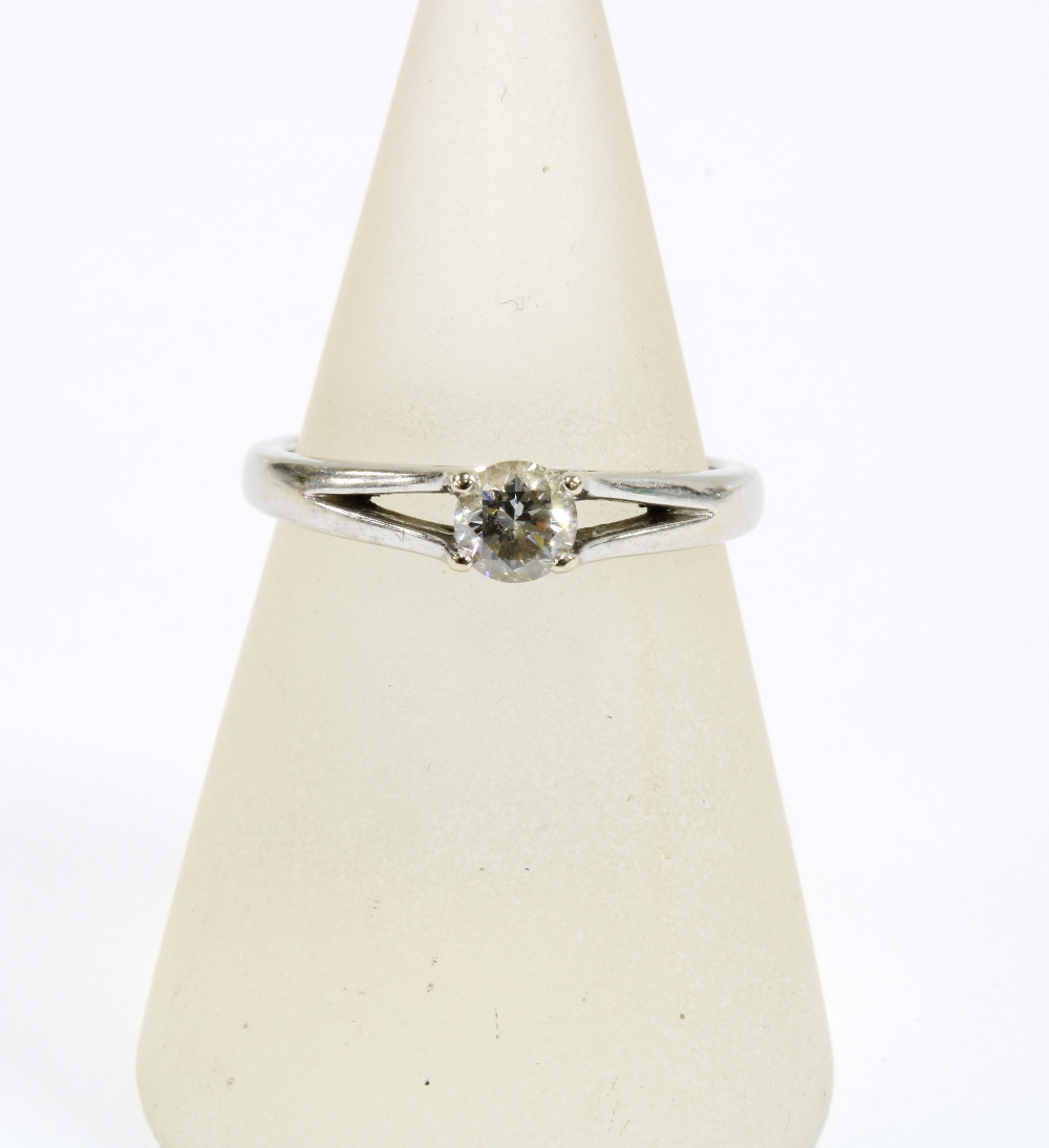 18ct white gold diamond solitaire ring by Kissing Diamond, with a smaller diamond set to the inner