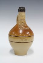 Victorian Doulton Lambeth, John Mortlock and Co, mask head whisky bottle with silver collar, 25cm