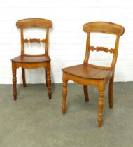 Pair of light mahogany chairs, curved top rail and carved vertical splat, solid seats and turned