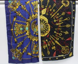 HERMES LES CLES SILK SCARF, black with red and gold pattern, together with another Hermes blue
