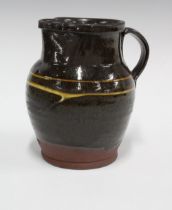 Art pottery slipware jug, 18 x 17cm.