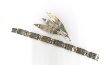 Icelandic silver bracelet and a Danish silver leaf brooch by Gertrude Engel Rougie, for Anton