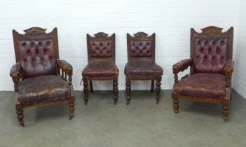 Pair of late 19th century open armchairs and two matching side chairs, with carved oak frames and