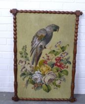 19th century beaded needlework panel of a Parrot contained within a mahogany bobbin frame, size