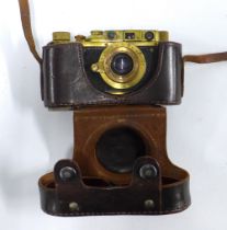 Replica camera marked Leica Bildberichter No. 15617, with leather carry case