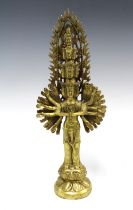 Gilt bronze figure of Ekadasamukha, 34cm