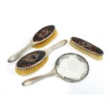 George VI silver and tortoiseshell brush set, with hand mirror, two hair brushes and one clothes