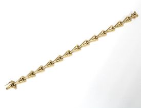 9ct gold bracelet with stylised triangular links, Chester 1956