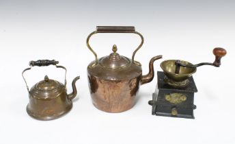 Copper kettle, 22cm, together with another smaller and an iron and brass Kendrick coffee grinder (3)