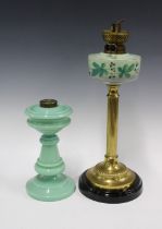 Brass corinthian column oil lamp with green glass well, 47cm, together with a smaller green glass