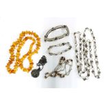 Amber beads, a silver and amber chain necklace, Modernist necklace and matching bracelet with