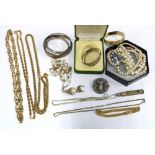 A vintage silver pendant, silver baby bangles, and a collection of costume jewellery to include gilt