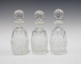 Three glass decanters and stoppers, 28cm. (3)