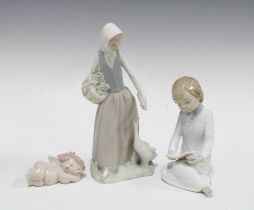 Three Nao Spanish porcelain figures (3) 24cm.