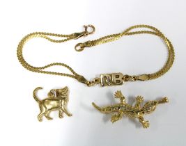 14k gold bracelet with RB initials, stamped 14k together with a 9ct gold lizard pendant and a 9ct