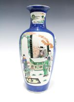 Chinese famille verte baluster vase with flared rim, painted with figures against a powder blue