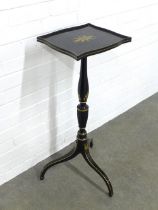Ebonised and parcel gilt kettle / torchere stand, on a fluted column with three outswept legs, 33
