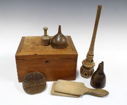 Treen and wooden kitchenalia to include a chocolate stirrer, butter pats, moulds and a pine box, etc