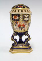 19th century Davenport imari pattern pot pourri jar with pierced cover on dolphin base 16cm high.