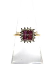 9ct gold ruby and diamond ring, with four square cut rubies within a surround of sixteen bright