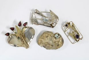 SHEANA M STEPHEN (SCOTTISH) a group of four silver and gemset brooches, all with SMS makers mark,