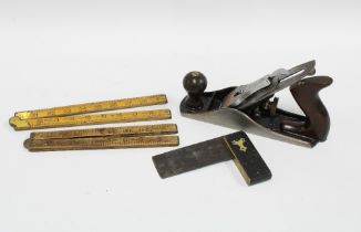 Box containing working tools to include a set square, ruler and a vintage Stanley No.4 plane.