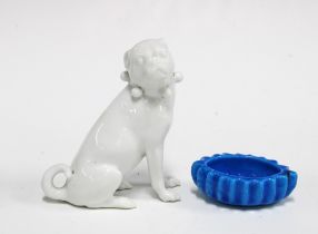 Meissen blanc de chine figure of a pug, modelled seated, blue crossed swords mark, together with