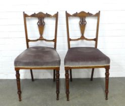Pair of rosewood and marquetry inlaid side chairs, shaped top rails and vasiform splats, upholstered