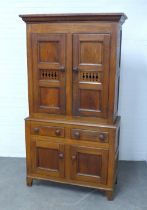 19th century oak and mahogany bread and cheese cupboard, the top section with a pair of triple