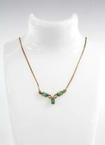 9ct gold diamond and green gemstone necklace, stamped 375 DIA